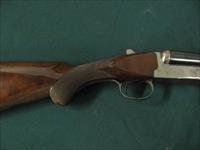 6733 Winchester 23 Pigeon XTR 12 gauge 26 barrels 3 inch chambers, vent rib, ejectors, single select trigger, beavertail, round knob, White line pad lop 14 1/4.coin silver rose and scroll receiver,opens closes tite,bores/brite/shiny. 98% co Img-6
