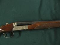 6733 Winchester 23 Pigeon XTR 12 gauge 26 barrels 3 inch chambers, vent rib, ejectors, single select trigger, beavertail, round knob, White line pad lop 14 1/4.coin silver rose and scroll receiver,opens closes tite,bores/brite/shiny. 98% co Img-7