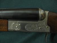 6733 Winchester 23 Pigeon XTR 12 gauge 26 barrels 3 inch chambers, vent rib, ejectors, single select trigger, beavertail, round knob, White line pad lop 14 1/4.coin silver rose and scroll receiver,opens closes tite,bores/brite/shiny. 98% co Img-11