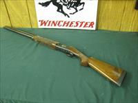 6594 Winchester 101 PRESENTATION SKEET, 12 gauge 27 inch barrels, skeet/skeet, 4 GOLD RAISED RELIEF PHEASANTS ENGRAVED ON DARK BLUE RECEIvER WITH ROSE AND SCROLL AA+ FANCY WALNUT stock and forend. 99.9% condition, none finer. priced to sell Img-1