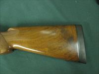 6594 Winchester 101 PRESENTATION SKEET, 12 gauge 27 inch barrels, skeet/skeet, 4 GOLD RAISED RELIEF PHEASANTS ENGRAVED ON DARK BLUE RECEIvER WITH ROSE AND SCROLL AA+ FANCY WALNUT stock and forend. 99.9% condition, none finer. priced to sell Img-2