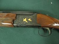 6594 Winchester 101 PRESENTATION SKEET, 12 gauge 27 inch barrels, skeet/skeet, 4 GOLD RAISED RELIEF PHEASANTS ENGRAVED ON DARK BLUE RECEIvER WITH ROSE AND SCROLL AA+ FANCY WALNUT stock and forend. 99.9% condition, none finer. priced to sell Img-3