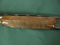 6594 Winchester 101 PRESENTATION SKEET, 12 gauge 27 inch barrels, skeet/skeet, 4 GOLD RAISED RELIEF PHEASANTS ENGRAVED ON DARK BLUE RECEIvER WITH ROSE AND SCROLL AA+ FANCY WALNUT stock and forend. 99.9% condition, none finer. priced to sell Img-4