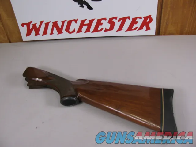 8110  Winchester 101 12 gauge stock, the wood measures 14 ½, with the pad it measures 15 ¾, pistol grip. 