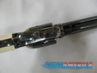 7509 Cimarron Uberti P SAA Cowboy 44 WCF 7 1/2 inch barrel, faux ivory grips, blue and case frame, single action,like new 99%. --210 602 6360--