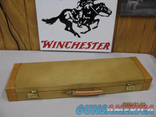 7805  Winchester 101 Golden Quail Hard case. It has the original keys. Only 500 made of these cases, complete your Golden Quail. 
