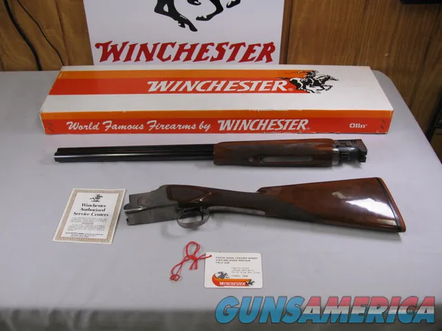 7751 Winchester 101 Pigeon FEATHERWEIGHT 12 gauge 26 barrels ic/im,STRAIGHT GRIP, 99% Winchester pad, Correct Winchester box serialized to the gun. A++Fancy figured walnut, vent rib, ejectors 1Pheasant and 2 quail engraved on coin silver re
