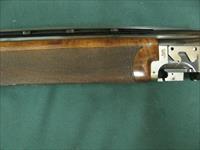 6778 Browning 725 Pro 12 gauge 30 inch barrels  6 chokes sk ic 2mod full, Browning Accessory box of trigers,weights, sites, etc. 99% condition, AA+ Fancy Walnut with figuring, AS NEW IN CASE. shot little.Adjustable comb/butt. Very nice and 