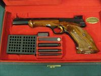 7261 Browning Medalist 22 long rifle  6.75 inch barrel. weight adapter and 3 weights, 2 blade folding screw driver, Pamplet,CASED. never fired, NEW IN CASE.vent rib, adj site, 1964-75mfg in Belgium,checkered thumb rest stock in Rosewood. no Img-3