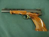 7261 Browning Medalist 22 long rifle  6.75 inch barrel. weight adapter and 3 weights, 2 blade folding screw driver, Pamplet,CASED. never fired, NEW IN CASE.vent rib, adj site, 1964-75mfg in Belgium,checkered thumb rest stock in Rosewood. no Img-4