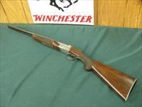 7316 Winchester 23 Pigeon XTR 20 gauge 25 inch barrels ic/ic, oil finished, not a mark on it. butt plate, vent rib ejectors, single select trigger, white front bead and mid bead, rose and scroll engraved coin silver receiver.99% condition Img-1