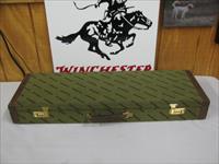 7475 Classic Doubles Sporter 12 gauge 28 inch barrels 3 extended cyl ic Lm wrench, 4 flush 2 full 2 extra full, 3 CLASSIC DOUBLES PAMPLETS, Winchester case,case for the chokes, AAA+Fancy Walnut. 99% condition, AS NEW IN CASE.----BEAUTIFU Img-1