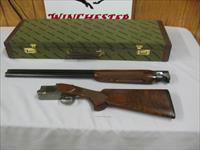 7475 Classic Doubles Sporter 12 gauge 28 inch barrels 3 extended cyl ic Lm wrench, 4 flush 2 full 2 extra full, 3 CLASSIC DOUBLES PAMPLETS, Winchester case,case for the chokes, AAA+Fancy Walnut. 99% condition, AS NEW IN CASE.----BEAUTIFU Img-4
