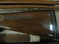 6547 Winchester 101 Skeet Set 20 gauge 28 gauge, 410 gauge, 28 inch barrels, skeet chokes, repaired forend on 410 gauge, numerous small marks on stock and forends.14 1/4 Pachmyer pad. Browning 3 barrel case.  Img-3