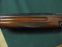 6547 Winchester 101 Skeet Set 20 gauge 28 gauge, 410 gauge, 28 inch barrels, skeet chokes, repaired forend on 410 gauge, numerous small marks on stock and forends.14 1/4 Pachmyer pad. Browning 3 barrel case.  Img-11