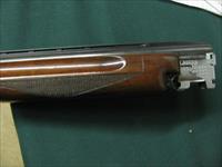 6547 Winchester 101 Skeet Set 20 gauge 28 gauge, 410 gauge, 28 inch barrels, skeet chokes, repaired forend on 410 gauge, numerous small marks on stock and forends.14 1/4 Pachmyer pad. Browning 3 barrel case.  Img-14