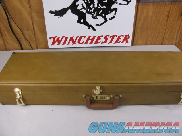 8079  Winchester Tan/Yellow Shotgun case trunk style. Yellow interior. Great condition will fit up to a 32” Barrel. 