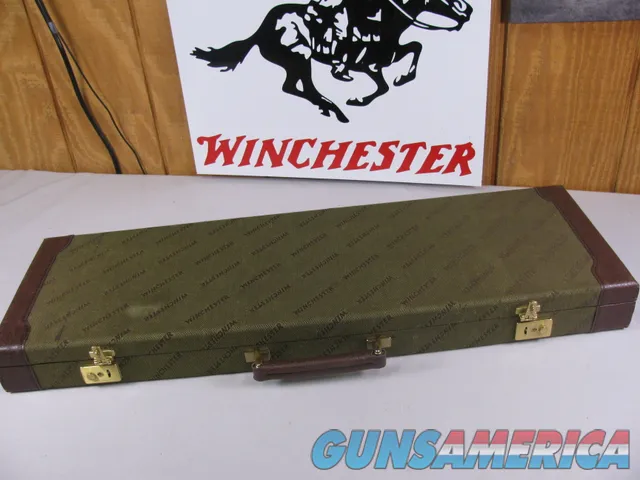 8085  Winchester 101 Shotgun, Green Trunk style hard case, Has two blocks, Comes with Winchester shotgun paperwork. 