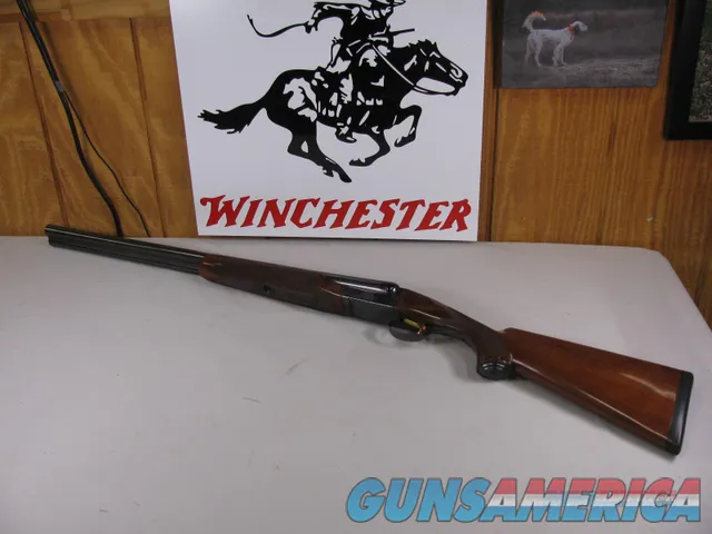 7822   Winchester model 23 custom 12GA SXS, one of only 500 made in 1987 only, SST, High luster blue, with 10 chokes, choke wrench and thread clean out tool. Vent rib, Gold Trigger, nice and tight, 27" barrels, 7LBS, nice and tight, collect