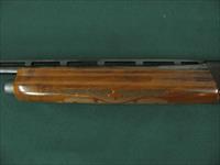 6517 Remington 1100 Lightweight 410 gauge 24 inch barrel mod fixed choke, vent rib, Remington butt plate, all original, light rust on loading tube under forend.  nice grain, tite, bores brite/shiny. Img-4