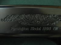 6517 Remington 1100 Lightweight 410 gauge 24 inch barrel mod fixed choke, vent rib, Remington butt plate, all original, light rust on loading tube under forend.  nice grain, tite, bores brite/shiny. Img-5