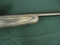 7352 Savage Mark II 22 long rifle, grey laminate stock, 3x9x45 Bushnell scope, 99.9% condition, medium weight barrel, not a mark on it. dont miss this great combo Img-12