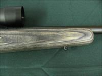 7352 Savage Mark II 22 long rifle, grey laminate stock, 3x9x45 Bushnell scope, 99.9% condition, medium weight barrel, not a mark on it. dont miss this great combo Img-13
