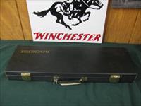 5092 Winchester 101 Lightweight 12 gauge, 27 inch barrels, 4 Winchokes, sk,im,f,xf,wrench keys,game scene coin silver engraved receiver. Correct Winchester case, square knob, Winchester butt pad, all original, vent rib, ejectors, 98% condit Img-1