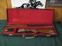 5092 Winchester 101 Lightweight 12 gauge, 27 inch barrels, 4 Winchokes, sk,im,f,xf,wrench keys,game scene coin silver engraved receiver. Correct Winchester case, square knob, Winchester butt pad, all original, vent rib, ejectors, 98% condit Img-2