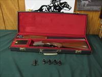 5092 Winchester 101 Lightweight 12 gauge, 27 inch barrels, 4 Winchokes, sk,im,f,xf,wrench keys,game scene coin silver engraved receiver. Correct Winchester case, square knob, Winchester butt pad, all original, vent rib, ejectors, 98% condit Img-3