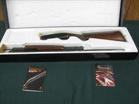 6837 Browning Model 12 20 gauge 26 inch barrels, mod fixed choke, Grade I, pump action, vent rib.  butt plate, all papers and booklets. correct Browning Box serialized to the gun. Fancy walnut. AS NEW IN BOX Img-3