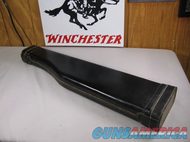 8750  Black Leather Shotgun Case, Hog Leg, Will take Side by Sides and Over and under. Will hold up to a 28” Barrel. 