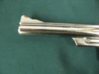 7264 Smith Wesson 29-2 44 magnum,Nickel, orange front adj squared notch rear, walnut grips, 6 inch barrel, all papers, drag line is almost imperceptible,99.9% condition.with tools. and papers and presentation case. one of the best Img-7