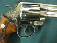 7264 Smith Wesson 29-2 44 magnum,Nickel, orange front adj squared notch rear, walnut grips, 6 inch barrel, all papers, drag line is almost imperceptible,99.9% condition.with tools. and papers and presentation case. one of the best Img-11