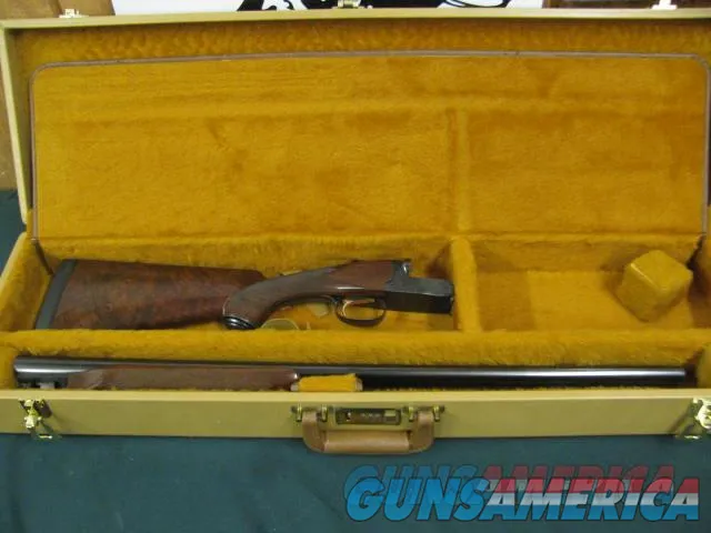 7194 Winchester 23 LIGHT DUCK 20 gauge 28 barrels 3 inch chambers, calledLADY DUCK, single select trigger ejectors,pistol grip, Wincester pad, Winchester correct case, FANCEY HIGHLY FIGURED WALNUT AAA+++. RAISED SOLID RIB. opens closes ti Img-3