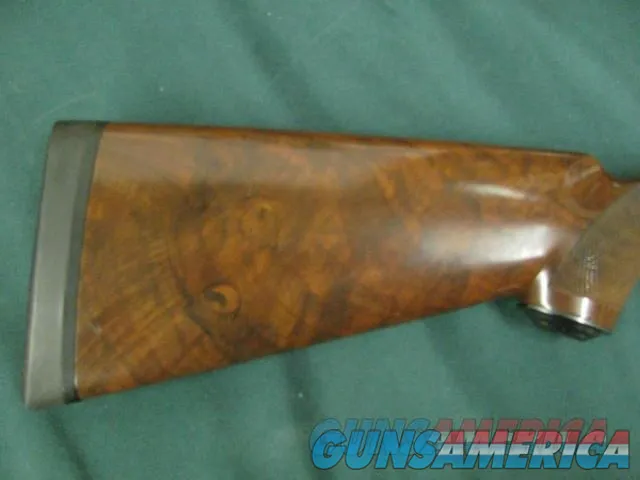 7194 Winchester 23 LIGHT DUCK 20 gauge 28 barrels 3 inch chambers, calledLADY DUCK, single select trigger ejectors,pistol grip, Wincester pad, Winchester correct case, FANCEY HIGHLY FIGURED WALNUT AAA+++. RAISED SOLID RIB. opens closes ti Img-7