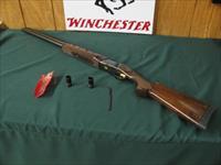 6645 Winchester 101 AMERICAN FLYER 12 gauge 28 inch barrels, top barrel is fixed extra full, bottom barrel is ic, mod, full, gold wire inlay outlines the dark blue lustrous frame with gold pigeon on bottom of receiver, has heavily highly fi Img-1