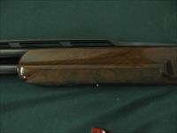 6645 Winchester 101 AMERICAN FLYER 12 gauge 28 inch barrels, top barrel is fixed extra full, bottom barrel is ic, mod, full, gold wire inlay outlines the dark blue lustrous frame with gold pigeon on bottom of receiver, has heavily highly fi Img-4