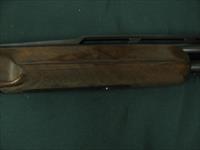 6645 Winchester 101 AMERICAN FLYER 12 gauge 28 inch barrels, top barrel is fixed extra full, bottom barrel is ic, mod, full, gold wire inlay outlines the dark blue lustrous frame with gold pigeon on bottom of receiver, has heavily highly fi Img-10