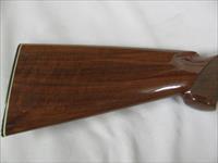 7597 Winchester 101 Pigeon XTR 28 gauge 28 barrels skeet/skeet 99% condition, BABY FRAME, rose and scroll coin silver receiver, all original, Winchester butt plate, ejectors, vent rib, 2 White beads, opens and closes tite,bores brite/shiny,