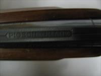 7597 Winchester 101 Pigeon XTR 28 gauge 28 barrels skeet/skeet 99% condition, BABY FRAME, rose and scroll coin silver receiver, all original, Winchester butt plate, ejectors, vent rib, 2 White beads, opens and closes tite,bores brite/shiny,