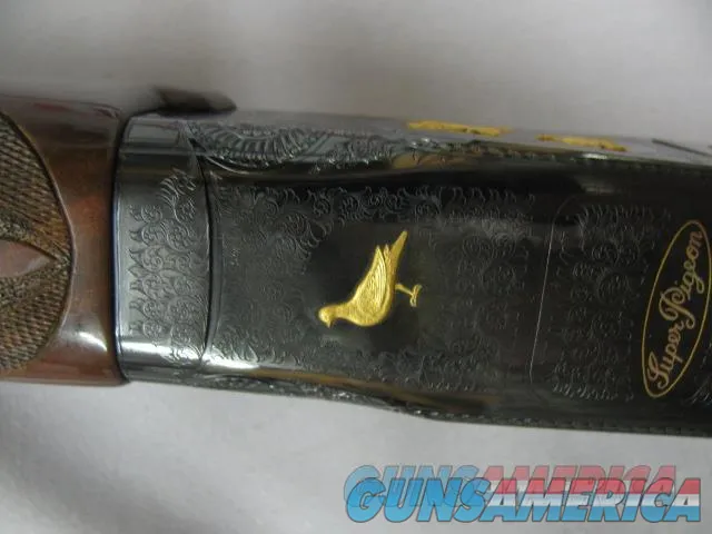 7549 Winchester 101 SUPER PIGEON 12 gauge cycl  sk  ltmod  imod xfull 7 GOLD IMAGES, 2 gold ducks left, gold bird dog&3 gold birds right side, GOLD PIGEON ON BOTTOM OF RECEIVER, GOLD SUPER PIGEON OVAL, all original 99% condition, AS NEW,  Img-6