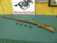 6926 Winchester 101 Waterfowler 12 gauge 30 inch barrels, 4 winchokes ic,2 mod,xf,pistol grip with cap Winchester butt pad,all original, 99% condition, not a mark on it. ducks/geese engraved on blue receiver. hard to get, A++fancy walnut. Img-1