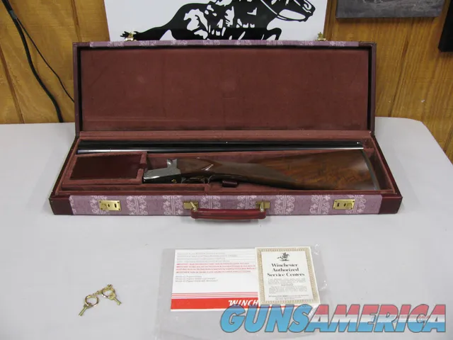 7739 Winchester 23 Grand Canadian 20 gauge 3 inch chambers, 26 inch barrels, beaver tail, ic/mod, vent rib, gold single select trigger, ejectors, 2 white beads,fleur-des-lies checkered side panels,99.9% condition with correct case and paper Img-2