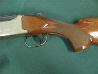 7166 Winchester 101 Lightweight 12 gauge 27 inch barrels 2 3/4&3inch chambers,ejectors, vent rib, pistol grip,Winchester butt pad,screw chokes, ic, mod 2 xfull, coins silver receiver with pheasants, quail grouse, black diamonds in stock. Img-3