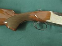 7166 Winchester 101 Lightweight 12 gauge 27 inch barrels 2 3/4&3inch chambers,ejectors, vent rib, pistol grip,Winchester butt pad,screw chokes, ic, mod 2 xfull, coins silver receiver with pheasants, quail grouse, black diamonds in stock. Img-11