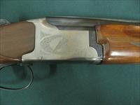 7166 Winchester 101 Lightweight 12 gauge 27 inch barrels 2 3/4&3inch chambers,ejectors, vent rib, pistol grip,Winchester butt pad,screw chokes, ic, mod 2 xfull, coins silver receiver with pheasants, quail grouse, black diamonds in stock. Img-13