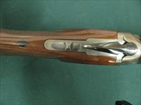 7166 Winchester 101 Lightweight 12 gauge 27 inch barrels 2 3/4&3inch chambers,ejectors, vent rib, pistol grip,Winchester butt pad,screw chokes, ic, mod 2 xfull, coins silver receiver with pheasants, quail grouse, black diamonds in stock. Img-16