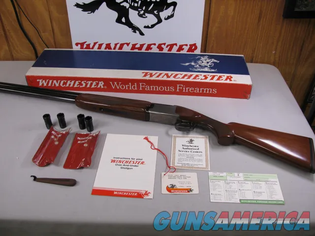 7762 Winchester 101 LIGHTWEIGHT 12 gauge 27 inch barrels, 6 winchokes, 2 pouches, wrench, complete set of Winchester papersHANG TAG, box is serialized to the shotgun, A+ Fancy Walnut, Pheasant, Quail, Woodcock coin silver engraved receiver Img-1