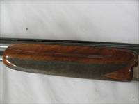 7598 Winchester 101 Pigeon Lightweight 12 gauge 27 inch barrels 2 ic,m,f,&wrench 4 Winchester screw in chokes, Browning case, round knob, 97% condition, white front bead, pheasants&quail engraved coin silver receiver,all original,opens and  Img-4